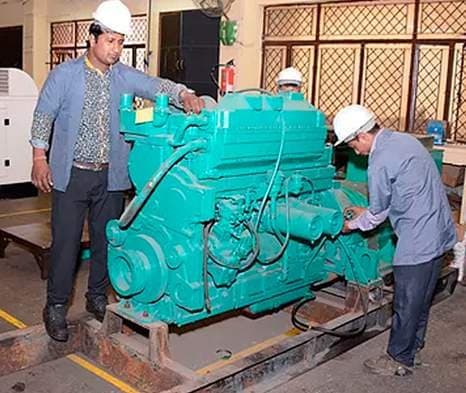 OVN engineers overhauling a diesel engine in workshop